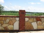 ozark natural stone wall - red brick trim