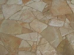 Use natural stone instead of concrete pavers for your patio or walkway.