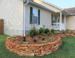 Curved Rust Colored Retaining Wall - Natural Stone - Poplar Bluff, MO