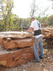 Splitting your sandstone takes patience and a good knowledge of the stone being worked. Usually a seam will have to be struck using a 12 pound sledge and a 4 pound splitter (wedge-headed hammer).
